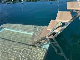 Swimming platform integrated steps