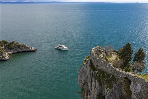 Aerial view of 2025 Pardo Yachts Endurance 60 near rocky coastline.