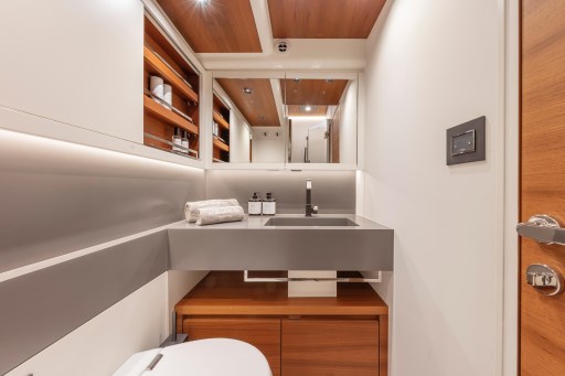 Luxurious bathroom interior of 2025 Pardo Yachts Endurance 60 with modern fixtures and wood accents.