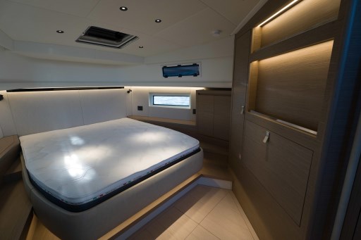 Luxurious cabin interior of 2026 Pardo Yachts 43, featuring a spacious bed and modern design.