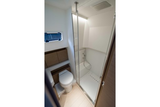 Modern bathroom in 2026 Pardo Yachts 43, featuring shower and toilet.