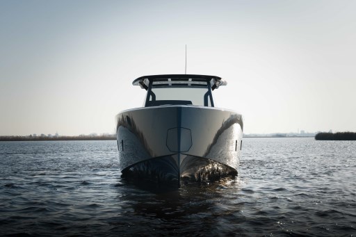 Front view of 2026 Pardo Yachts 43 on calm water under clear sky.