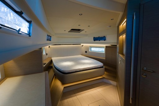 Luxurious interior cabin of 2026 Pardo Yachts 43, featuring a spacious bed and modern design.