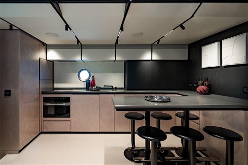 Modern kitchen interior on 2025 VanDutch 75 yacht, featuring sleek design and contemporary furnishings.