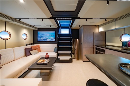 Luxurious interior of 2025 VanDutch 75 yacht with modern design and elegant furnishings.