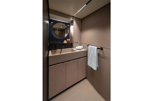 Luxurious bathroom interior of 2025 VanDutch 75 yacht with modern design and elegant fixtures.