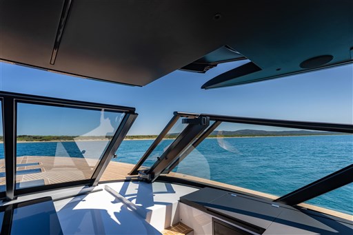 Luxurious VanDutch 75 yacht interior with panoramic ocean view, 2025 model.