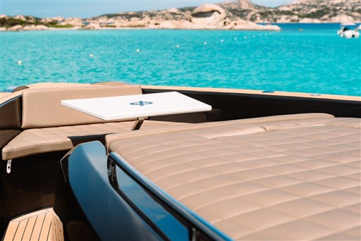 2025 Pardo Yachts 50 with luxurious deck, overlooking turquoise waters and scenic coastline.