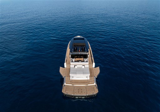 2025 Pardo Yachts GT75 on calm blue sea, rear view.