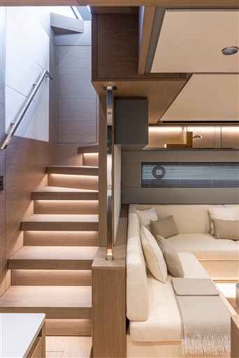 Interior of 2025 Pardo Yachts GT75, featuring modern staircase and luxurious seating area.