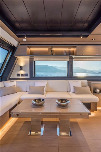 Luxurious interior of 2025 Pardo Yachts GT75 with elegant seating and scenic ocean view.