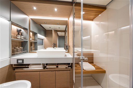 Luxurious bathroom interior of 2025 Pardo Yachts GT75 with modern fixtures and wooden accents.