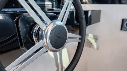 Steering wheel of 2024 Apreamare GOZZO 38 CABIN yacht, featuring sleek metallic design.