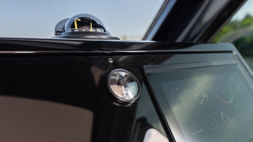 Dashboard of 2024 Apreamare GOZZO 38 CABIN with compass and display.