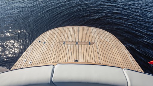 2024 Apreamare GOZZO 38 CABIN yacht with teak deck on calm water.