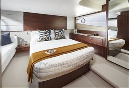 [I]  v50-open-interior-owners-stateroom-walnut-satin-scaled