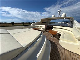 Luxurious 2008 Riva 115 Athena yacht deck with elegant seating and stunning views.