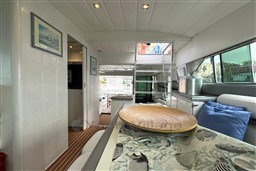 Interior of 1989 Mochi Craft MOCHI 56 yacht, featuring modern decor and comfortable seating.