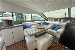 Luxurious interior of 1989 Mochi Craft MOCHI 56 yacht with elegant seating and decor.