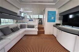 Luxurious interior of 1989 Mochi Craft MOCHI 56 yacht with elegant seating and modern decor.