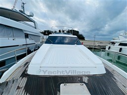 Sanlorenzo 62 yacht, 1996 model, docked with sleek design and spacious deck.