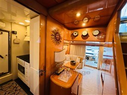 Luxurious interior of a 1996 Sanlorenzo 62 yacht with elegant decor and modern amenities.