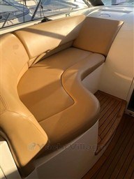 Luxurious tan leather seating on 2005 Jeanneau Prestige 34 S yacht.