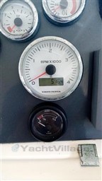 Close-up of Jeanneau Prestige 34 S 2005 boat dashboard gauges, showing RPM and other indicators.