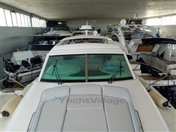 2005 Jeanneau Prestige 34 S yacht in indoor storage facility.