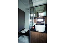 Luxurious bathroom in 2025 Azimut Atlantis 45 yacht with modern fixtures and elegant design.