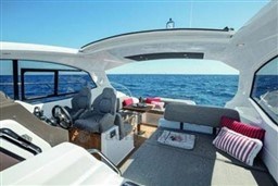 2025 Azimut Atlantis 45 yacht interior with ocean view, featuring luxurious seating and modern design.