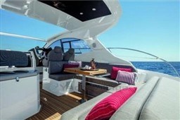 2025 Azimut Atlantis 45 yacht interior with luxurious seating and ocean view.