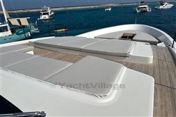 Luxurious 2024 Sanlorenzo SL120 A yacht with spacious sunbathing deck, docked in serene waters.