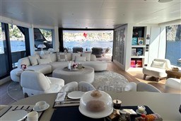 Luxurious interior of 2024 Sanlorenzo SL120 A yacht with elegant seating and sea view.