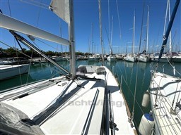 Beneteau Oceanis 38.1 sailboat docked in a marina, 2021 model.