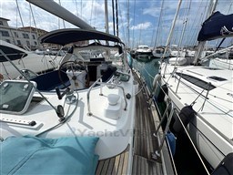 Beneteau Oceanis 40 CC sailboat docked in marina, showcasing deck and helm, 2001 model.