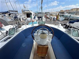 Beneteau Oceanis 40 CC sailboat cockpit with blue seating, docked in a marina, 2001 model.