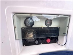 Control panel of 2001 Beneteau Oceanis 40 CC sailboat with gauges and switches.