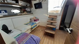 Interior of 2013 Rio Yachts Rio 36, featuring cozy seating and modern amenities.