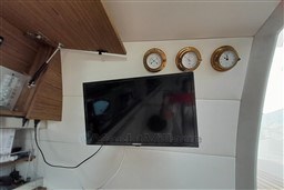 Interior of 2013 Rio Yachts Rio 36 with TV and nautical instruments.