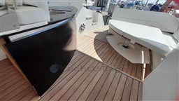 Luxurious 2013 Rio Yachts Rio 36 interior with sleek seating and wooden flooring.