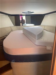 Interior cabin of 2013 Rio Yachts Rio 36 with bed and seating area.
