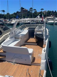 2013 Rio Yachts Rio 36 docked, featuring spacious deck and elegant seating.