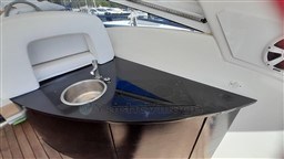 Compact kitchenette on 2013 Rio Yachts Rio 36 with sink and cooktop.