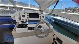 Cockpit of 2013 Rio Yachts Rio 36, featuring modern navigation controls and steering wheel.