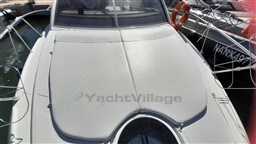 2013 Rio Yachts Rio 36 boat deck with sunpad and lifebuoy in marina.