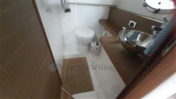 Bathroom interior of 2013 Rio Yachts Rio 36, featuring modern sink and toilet.