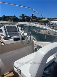 Cockpit of 2013 Rio Yachts Rio 36 with steering wheel and navigation equipment.