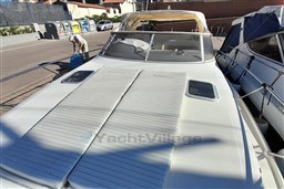 2002 Cranchi Smeraldo 37 yacht docked, featuring sleek design and spacious deck.