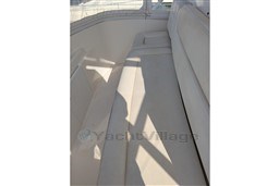 2005 Tiara Yachts 3900 Convertible interior seating area with white upholstery.